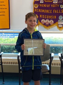 Christian receives the “Do the Right Thing” Award